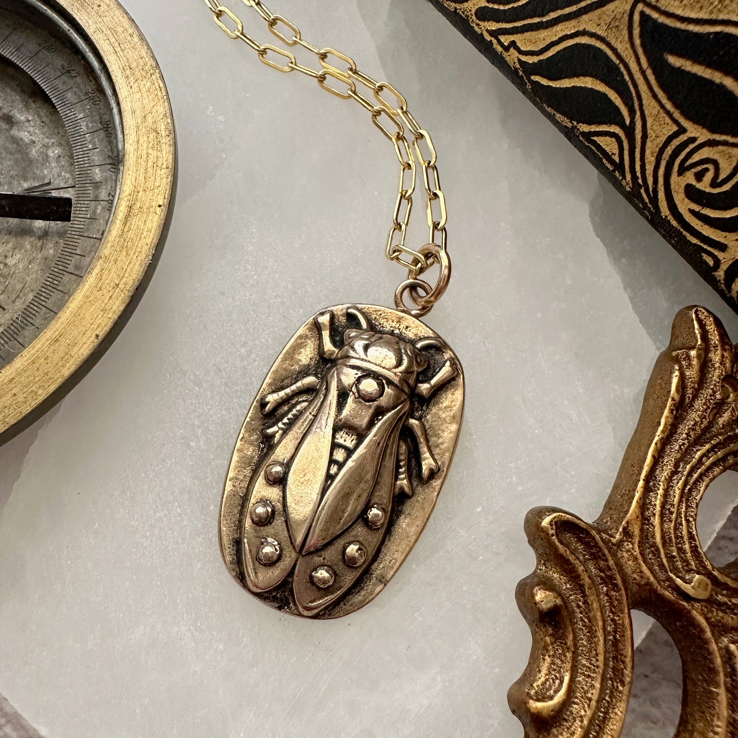 
                  
                    CICADA Riveted Necklace | Bronze
                  
                