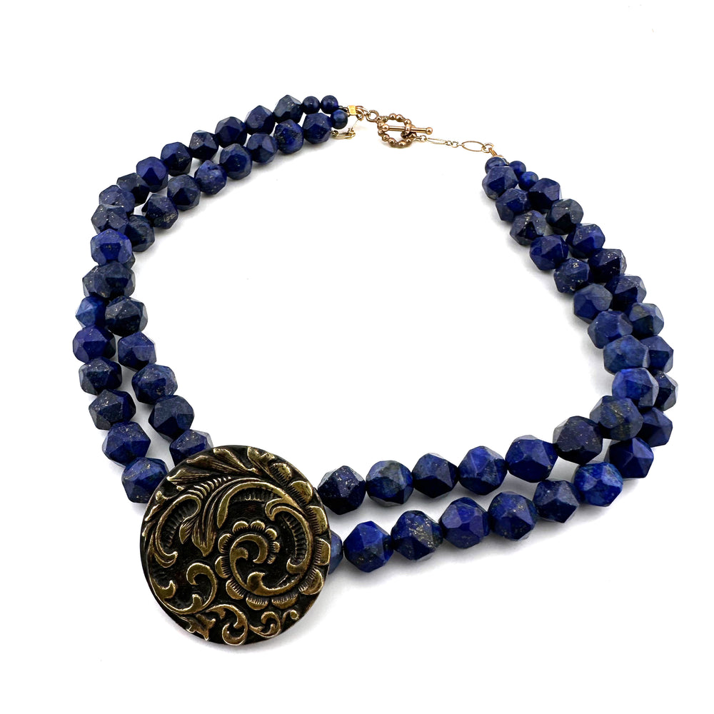 
                  
                    FLOURISH Necklace in Star Cut Lapis Lazuli
                  
                