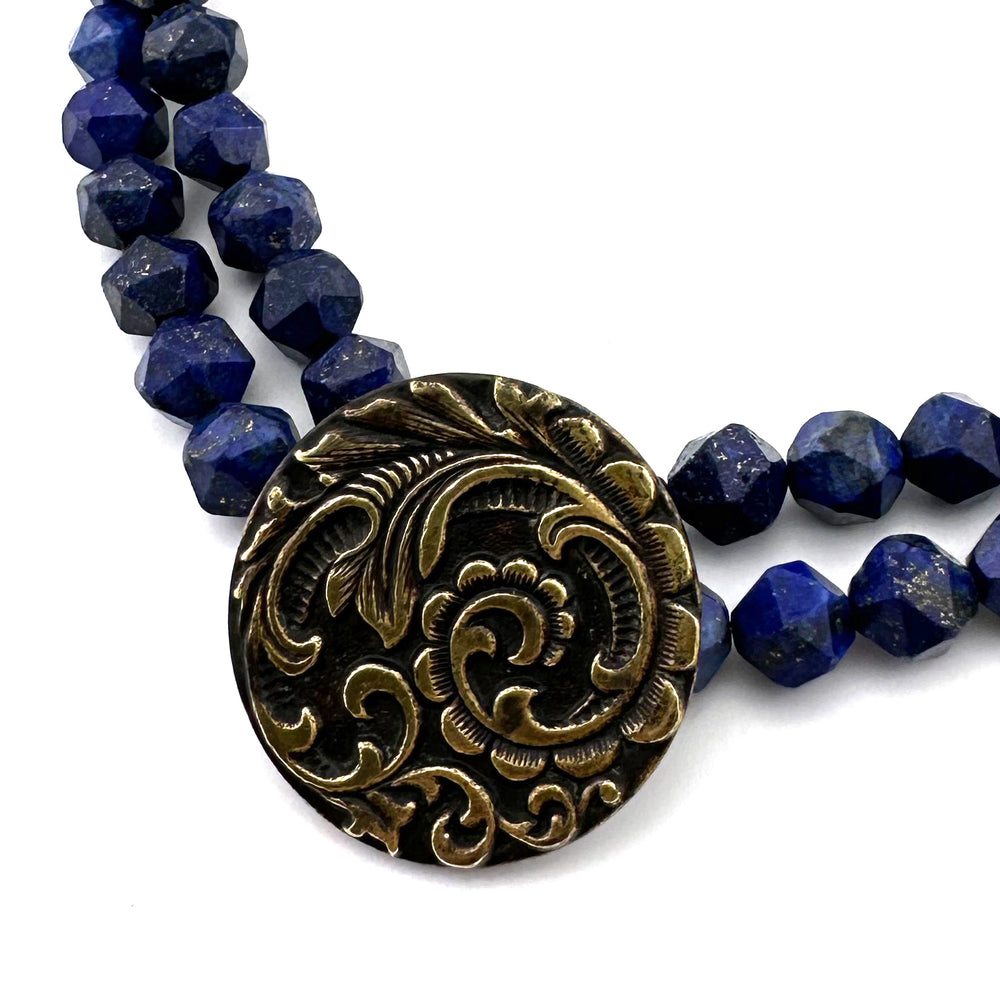 
                  
                    FLOURISH Necklace in Star Cut Lapis Lazuli
                  
                