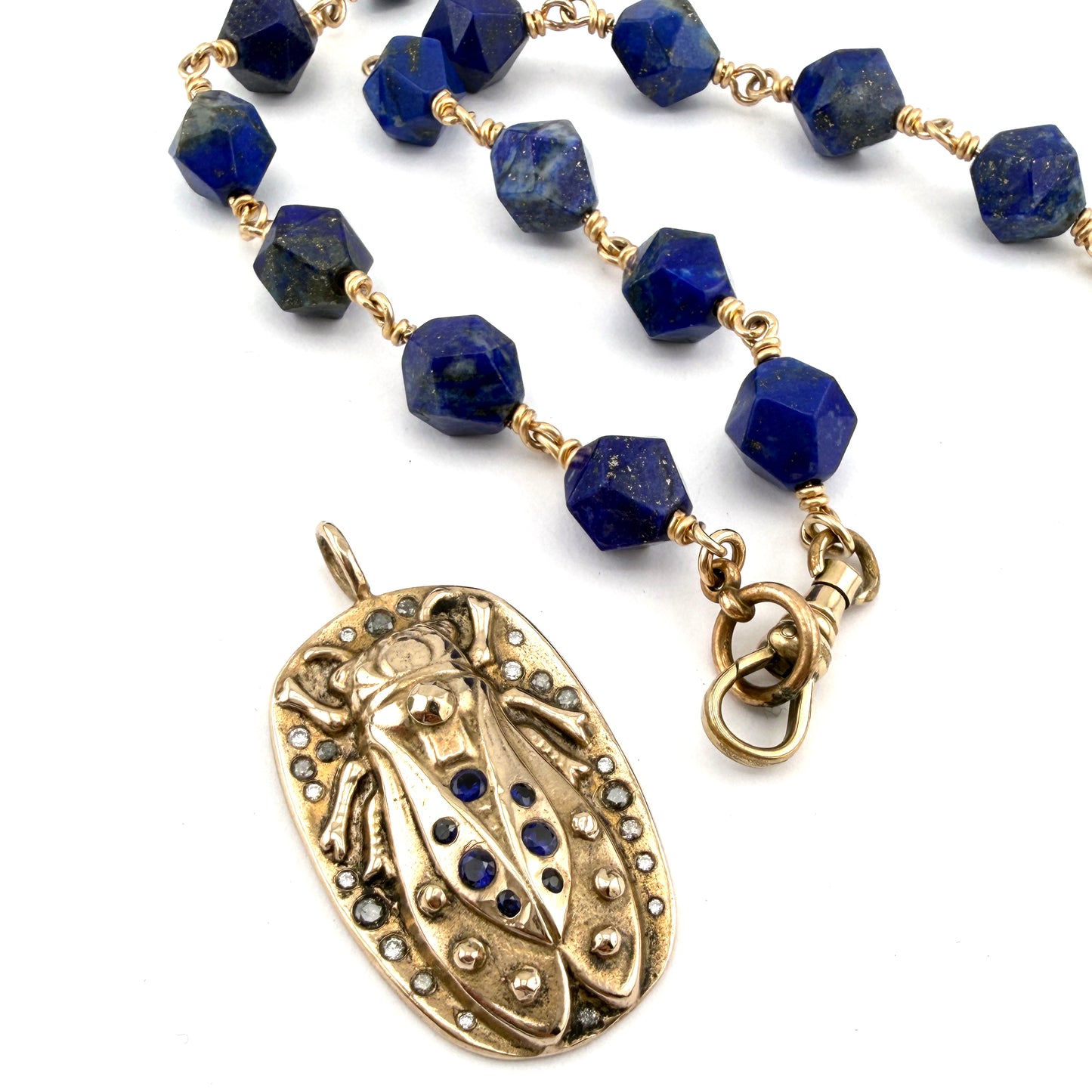 
                  
                    Collector's Charm Keeper Necklace: Lapis Lazuli on Gold-Filled Chain
                  
                