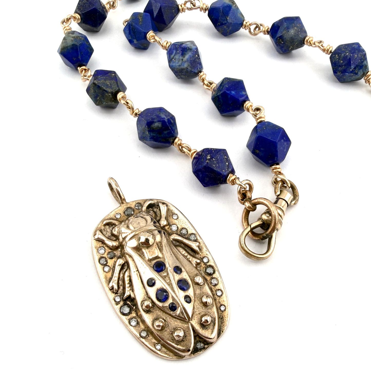 
                  
                    CICADA Luxe Necklace 29 Blue Sapphires and Diamonds on Lapis Lazuli
                  
                