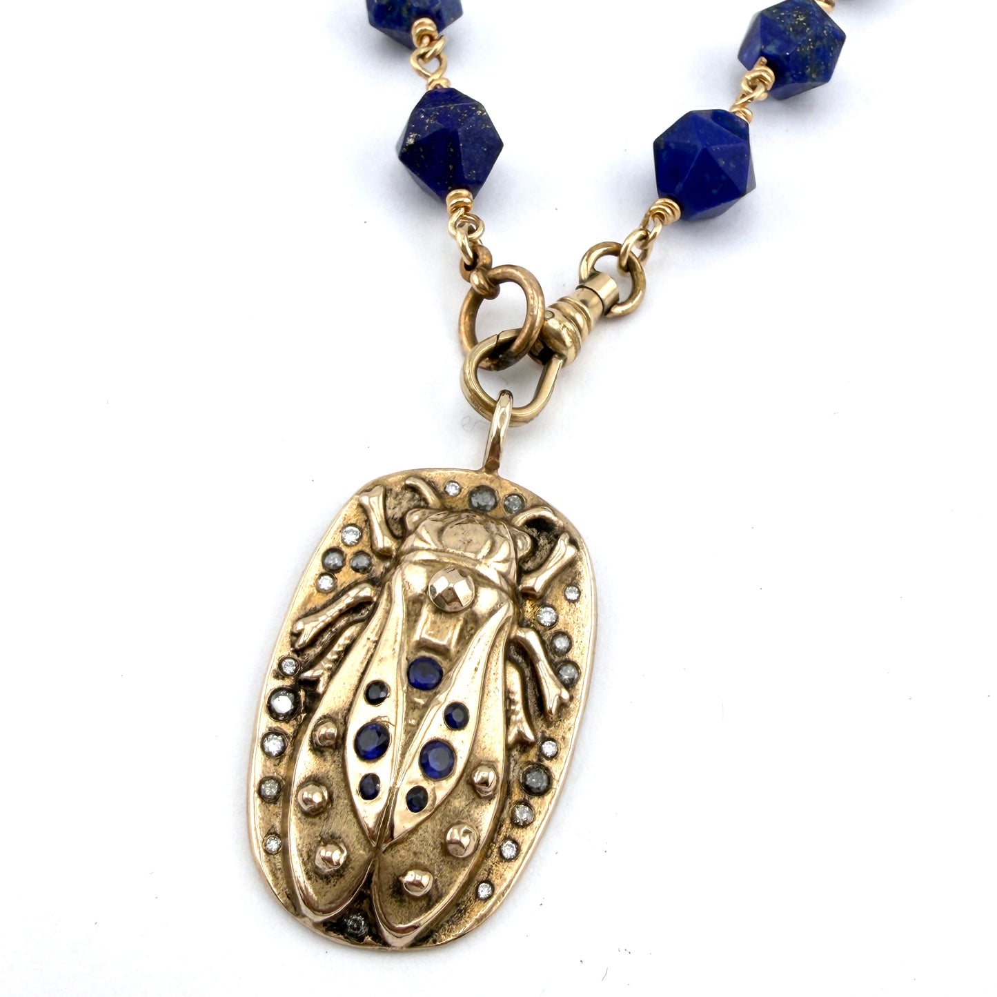 
                  
                    CICADA Luxe Necklace 29 Blue Sapphires and Diamonds on Lapis Lazuli
                  
                