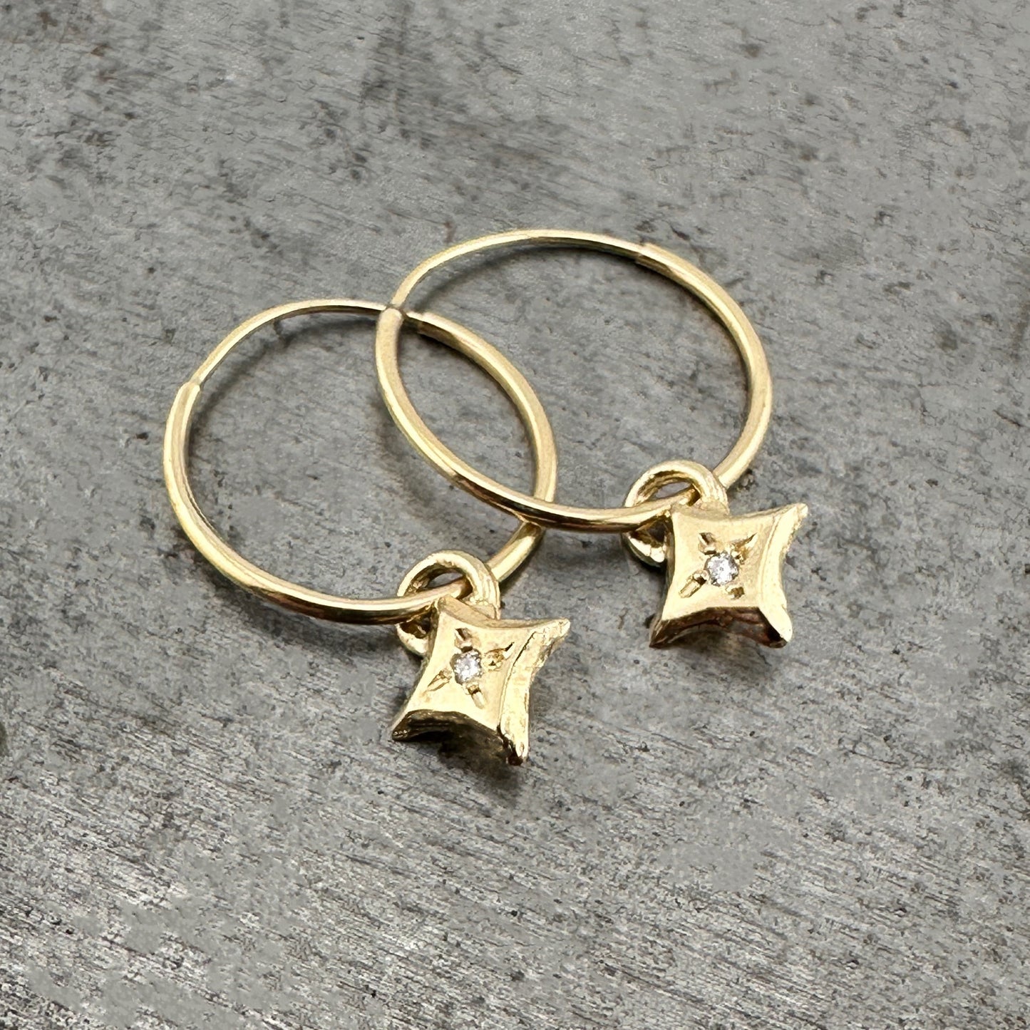 
                  
                    SPARKLE Tiny Hoops - 10k Gold with White Diamonds
                  
                