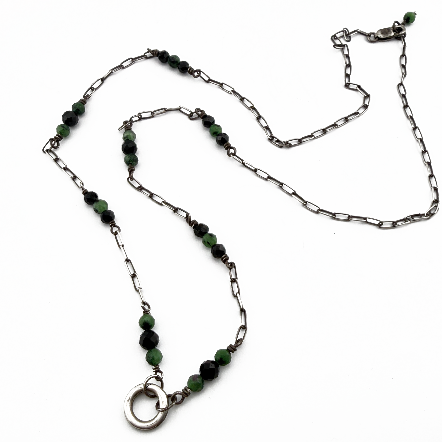 
                  
                    Collector's Charm Keeper Necklace: Black Spinel & Green Ruby Zoisite in Silver
                  
                