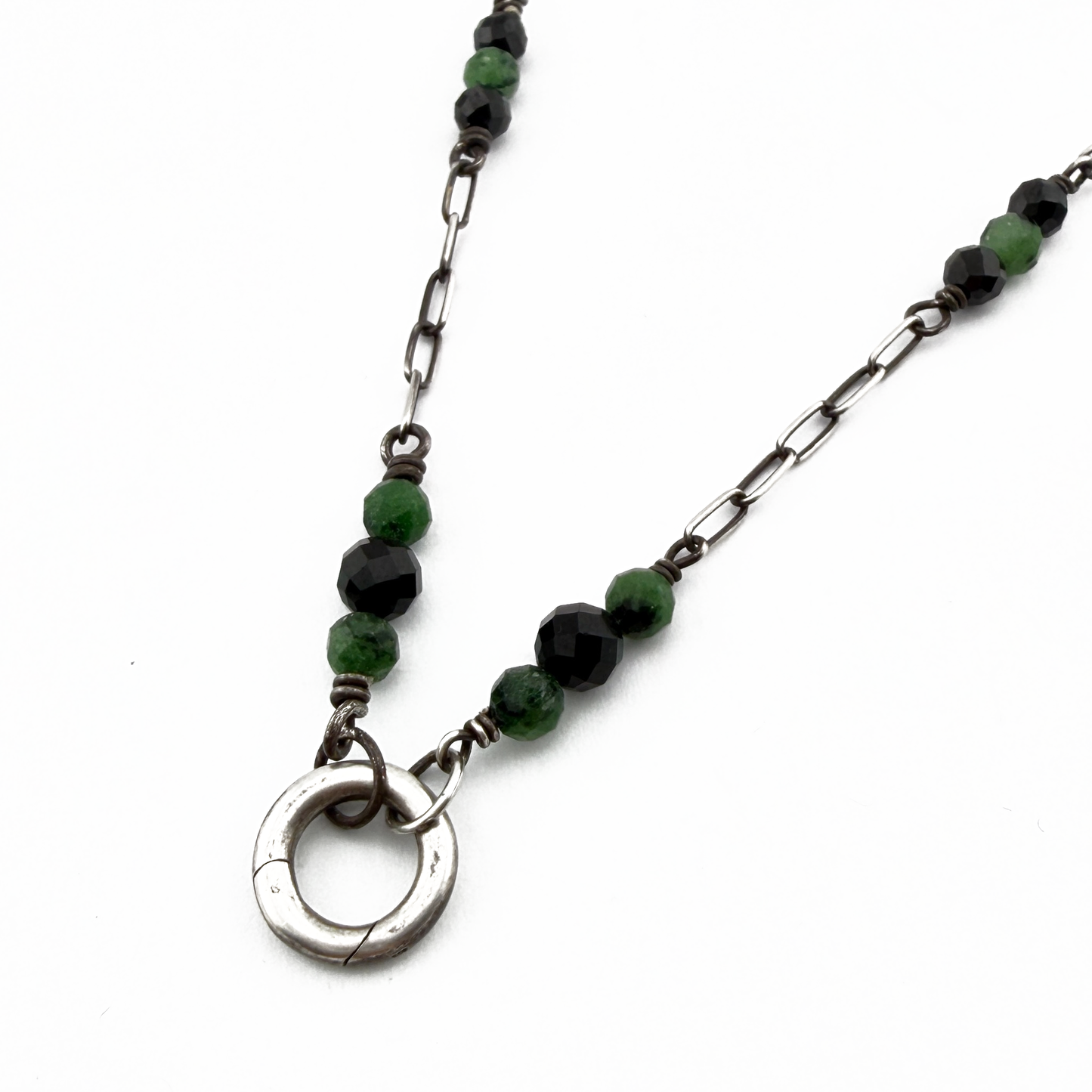 
                  
                    Collector's Charm Keeper Necklace: Black Spinel & Green Ruby Zoisite in Silver
                  
                