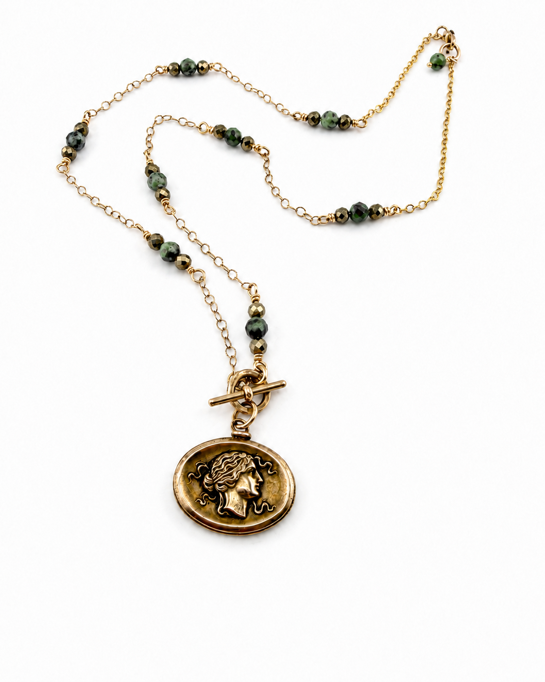 
                  
                    SELENE Intaglio Necklace - Bronze with Ruby Zoisite and Pyrite
                  
                