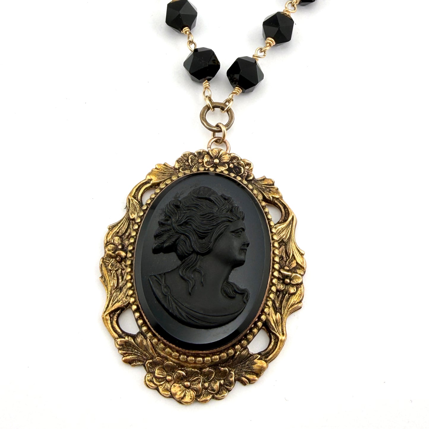 
                  
                    Antique Black Cameo with Star Cut Onyx
                  
                