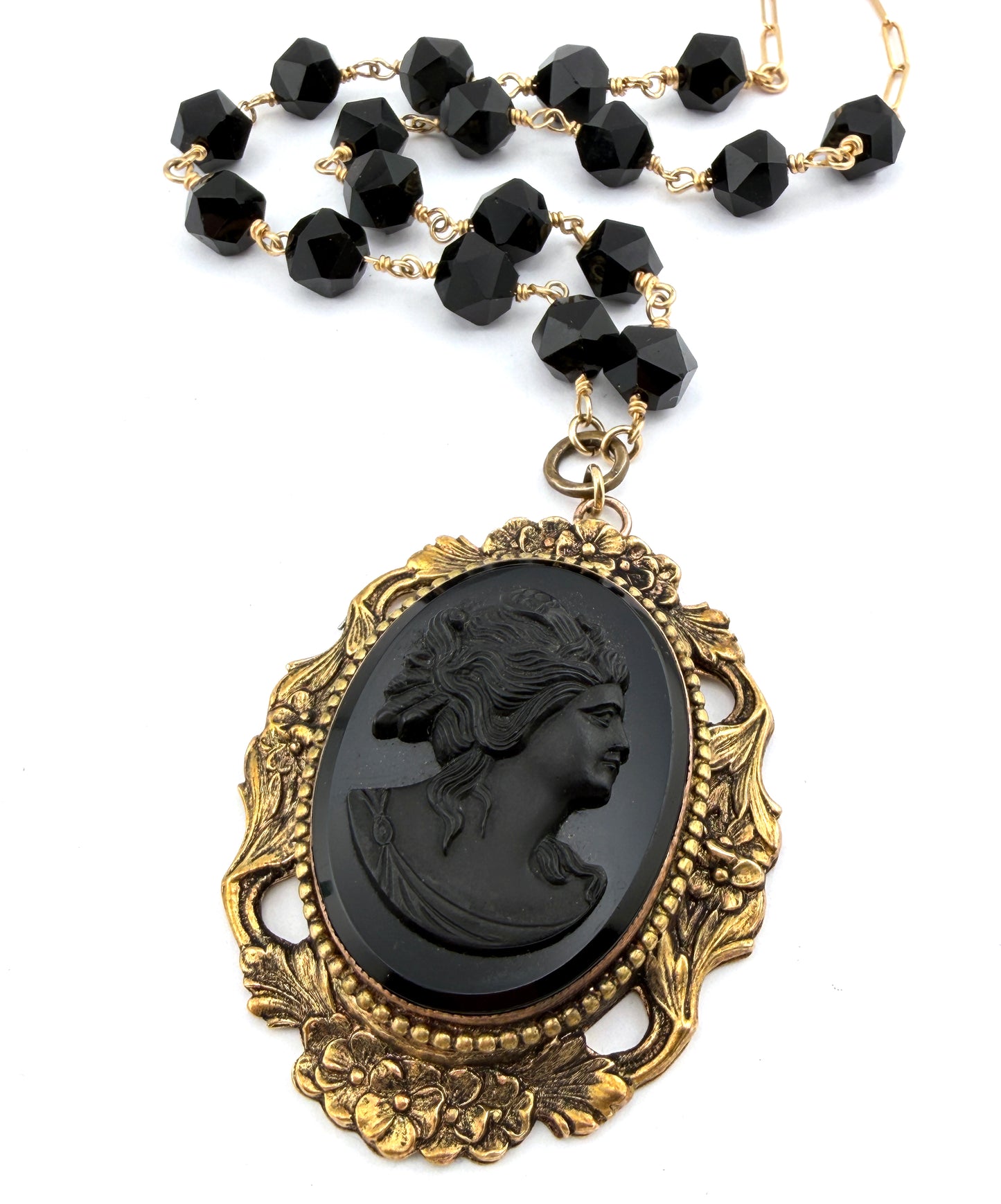 
                  
                    Antique Black Cameo with Star Cut Onyx
                  
                
