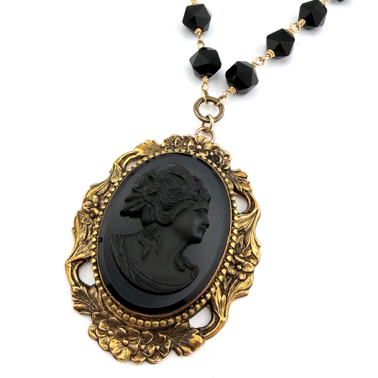 
                  
                    Antique Black Cameo with Star Cut Onyx
                  
                