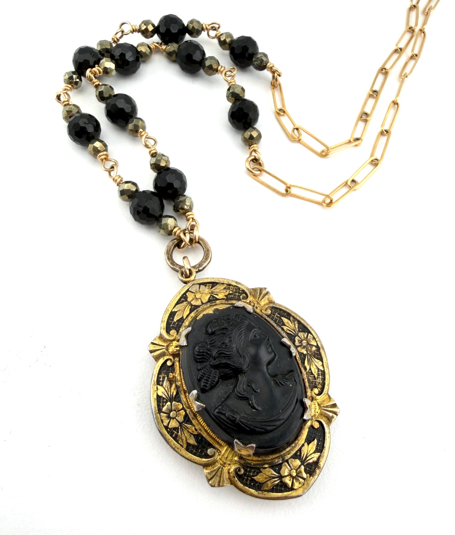 
                  
                    Antique Black Cameo Locket with Black Spinel and Pyrite
                  
                