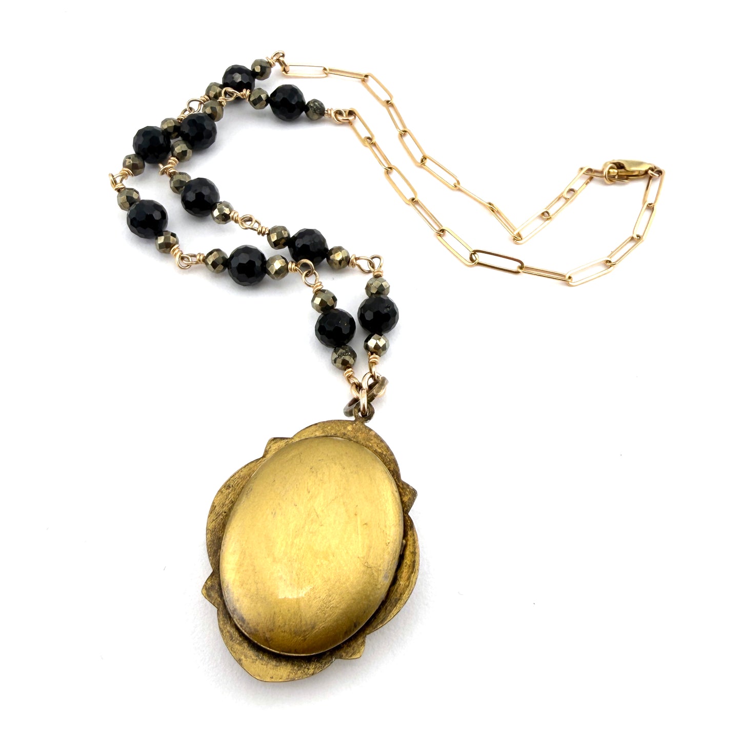 
                  
                    Antique Black Cameo Locket with Black Spinel and Pyrite
                  
                