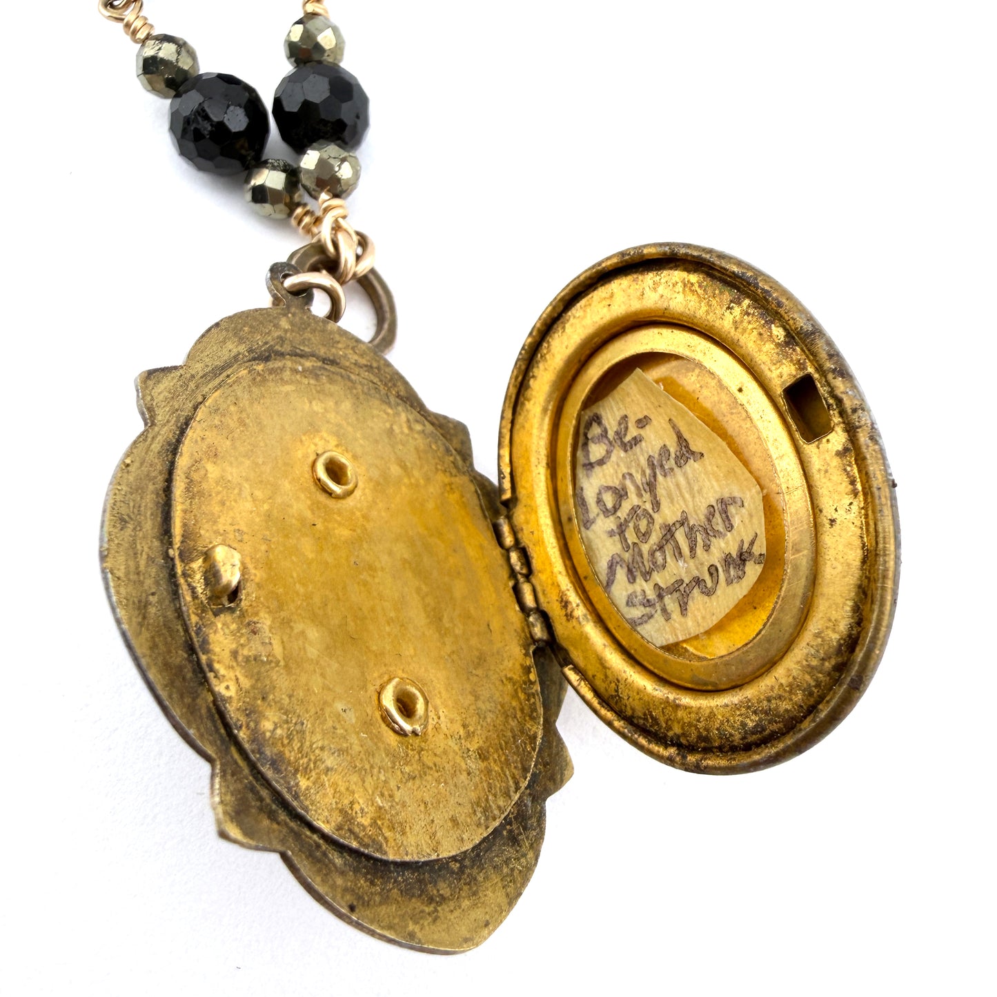 
                  
                    Antique Black Cameo Locket with Black Spinel and Pyrite
                  
                