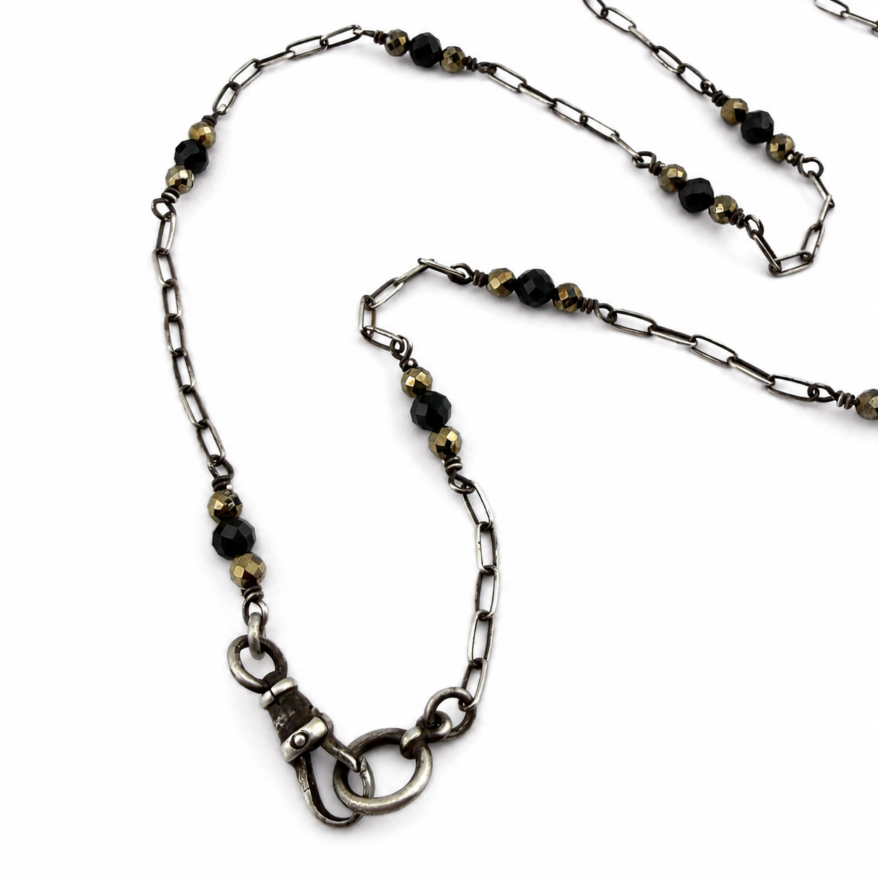 
                  
                    Collector's Charm Keeper Necklace: Black Spinel & Pyrite in Silver
                  
                