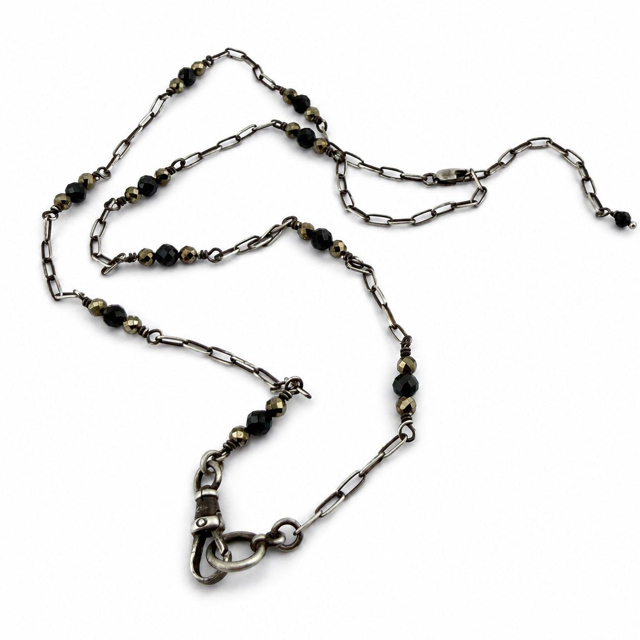 
                  
                    Collector's Charm Keeper Necklace: Black Spinel & Pyrite in Silver
                  
                