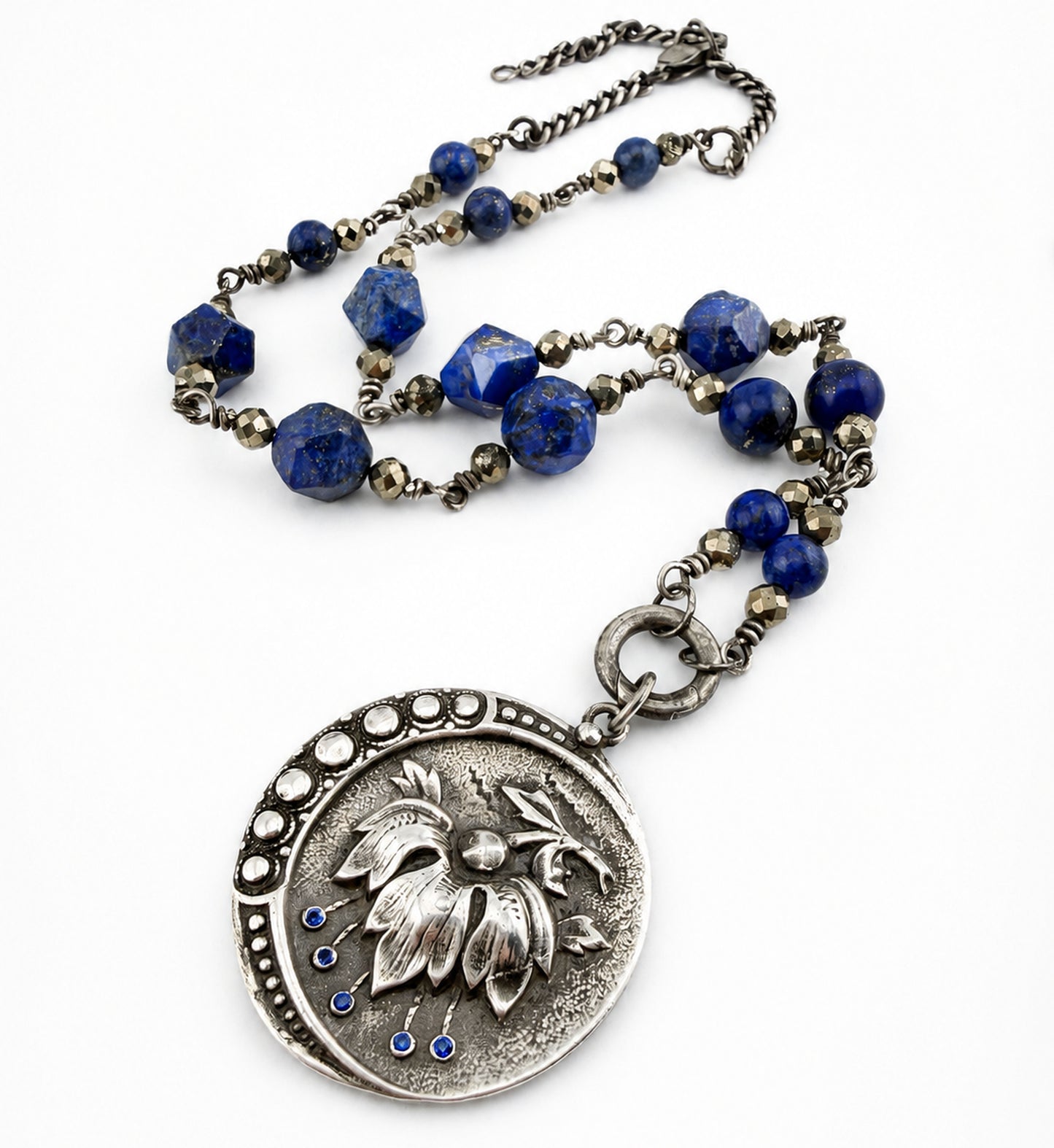 
                  
                    PERSEPHONE Necklace - Blue Sapphires in Silver
                  
                