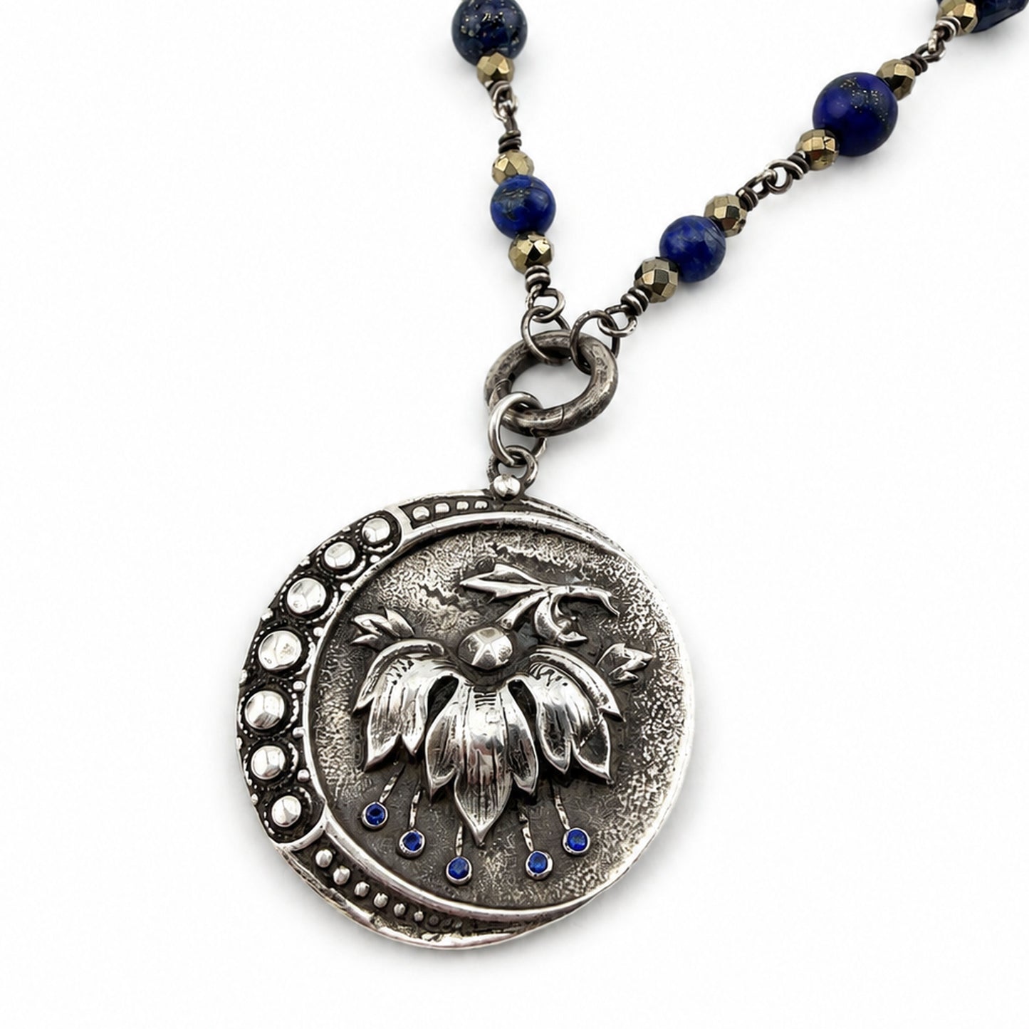 
                  
                    PERSEPHONE Necklace - Blue Sapphires in Silver
                  
                