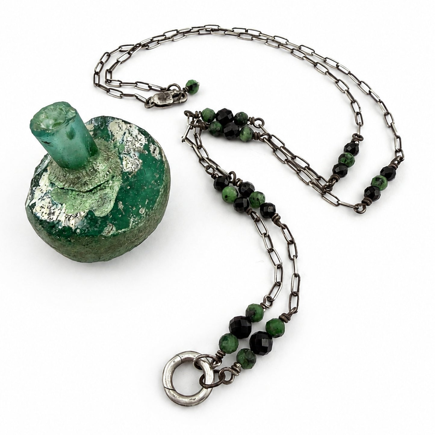 
                  
                    Collector's Charm Keeper Necklace: Black Spinel & Green Ruby Zoisite in Silver
                  
                
