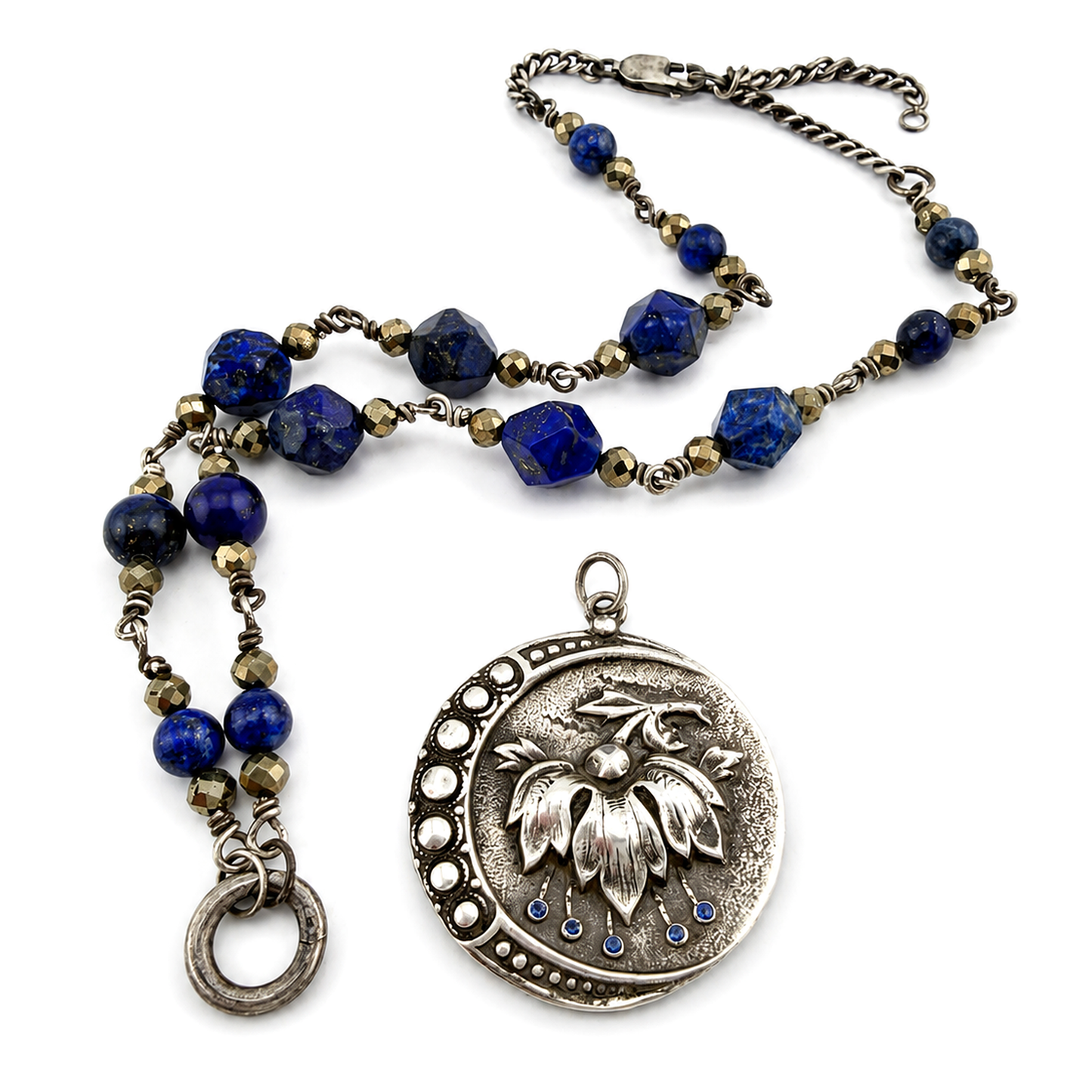
                  
                    PERSEPHONE Necklace - Blue Sapphires in Silver
                  
                