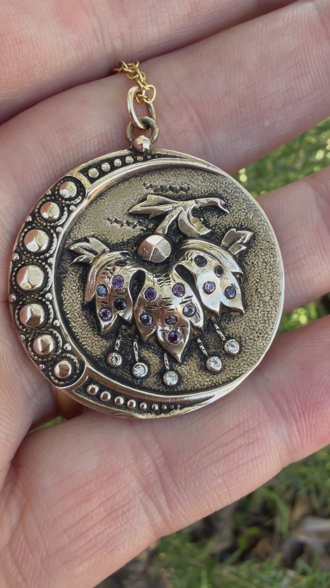 
                  
                    Load and play video in Gallery viewer, PERSEPHONE Necklace - Pink Sapphires and White Diamonds in Bronze
                  
                