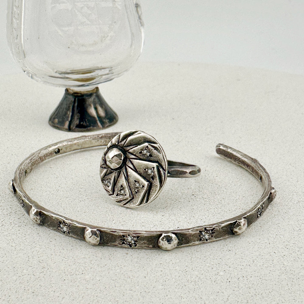 
                  
                    RIVETED Cuff Bracelet - Silver with White Diamonds
                  
                