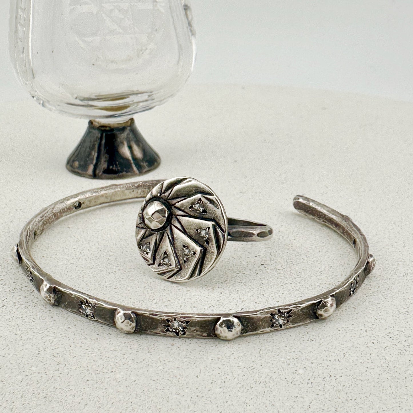 
                  
                    RIVETED Cuff Bracelet - Silver with White Sapphires
                  
                